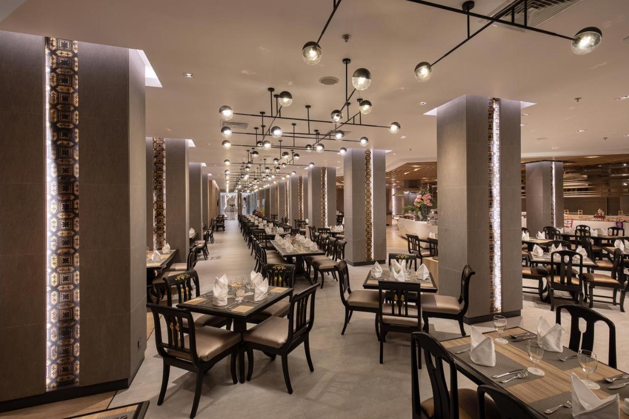 The Heritage Chiang Rai Hotel And Convention Exterior foto The restaurant's interior